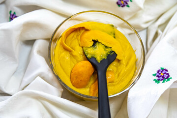 Traditional and exotic Brazilian dish rice, chicken and pequi (caryocar brasileinse) 