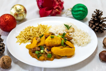 Traditional and exotic Brazilian dish rice, chicken and pequi (caryocar brasileinse) 