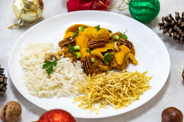 Traditional and exotic Brazilian dish rice, chicken and pequi (caryocar brasileinse) 
