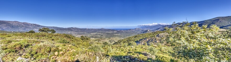 Fototapeta premium Panoramic view of Cap Corse coast from the mountains with the sea in the background
