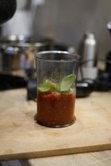tomato sauce pasta basil in a container preparing for italian pasta home made kitchen cooking family