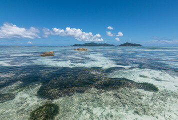 Shallow Water at the Beach of La Digue Island. Anse Source D' Argent.