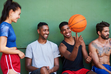 Team, basketball and happy people spinning ball at court for match, fitness exercise and wellness....