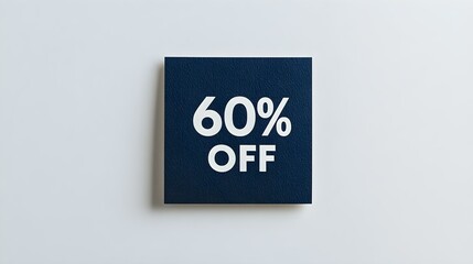 White '60% OFF' Text on a Navy Blue Square Paper Note. White Background with Copy Space