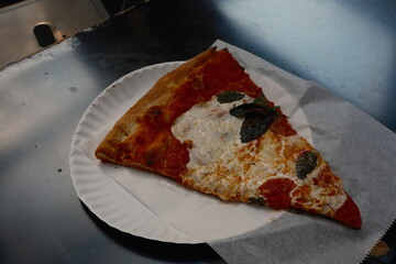 close up of a slice of pizza