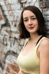 Outdoor portrait of a white 17 yo girl in Molenbeek, Brussels, Belgium