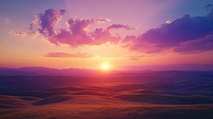 Obraz premium A breathtaking landscape of rolling hills under a vibrant sunset, with colors blending beautifully across the sky.