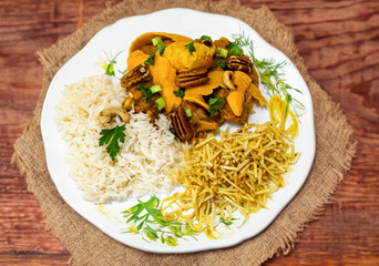 Gourmet and exotic Brazilian dish rice, chicken and pequi (caryocar brasileinse) 