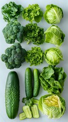 A flat lay of fresh green vegetables, including broccoli, lettuce, cucumbers, and herbs, neatly arranged on a white background. Ideal for healthy lifestyle or food-related concepts.