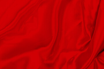 Rippled red silk fabric background