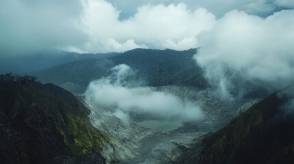 Obraz premium Volcanic Landscape Covered in Clouds