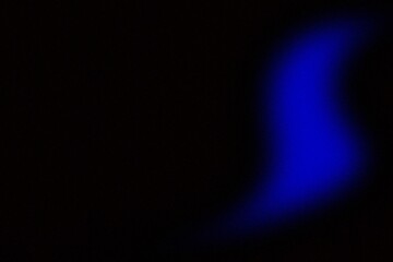 Glowing blue abstract shape, dark grainy black blue background, noise texture futuristic dynamic poster header cover wallpaper banner backdrop design