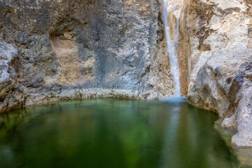 View of one of the pools of the Somogil baths in the Hondares stream in Moratalla, Region of Murcia, Spain with emerald green waters
