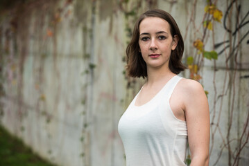 Fototapeta premium Outdoor portrait of a white 17 yo girl in Molenbeek, Brussels, Belgium