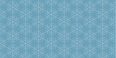 Geometric Snowflake Pattern on Blue Background