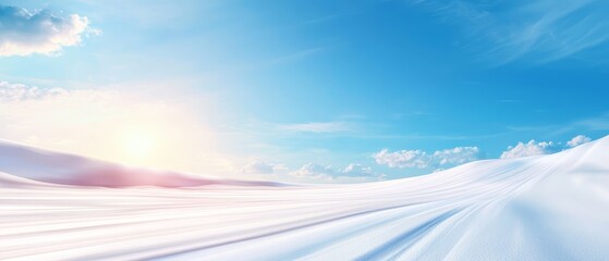 A snow covered field with a blue sky and clouds