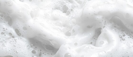 Naklejka premium A close up of a white foam with water droplets