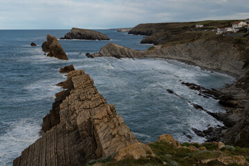 Rocks in the atlantic ocean. Spanish atlantic coast with rock formation. Flysch