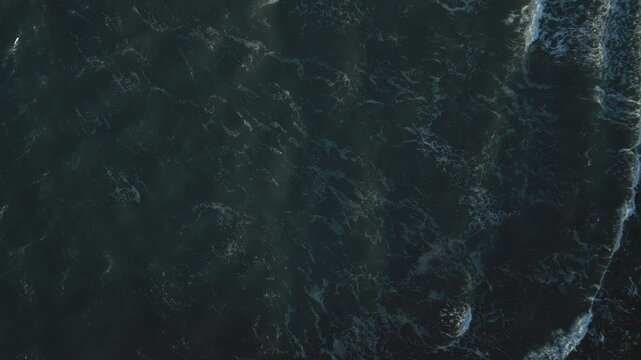 Shoreline surf aerial view, Blackpoint Bay, Nova Scotia, MAX QUAL PRORES422HQ Transcode of 4K H.265 D-CINELIKE original capture with SpectrumGrades CinemasterPure Master Film Neutral LUT applied.