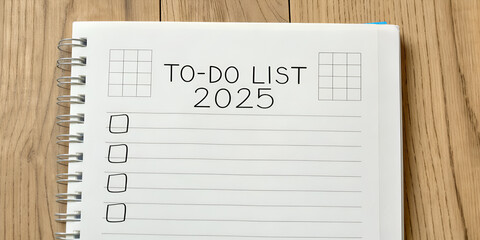 "to-do list 2025" on notebook page on wood background