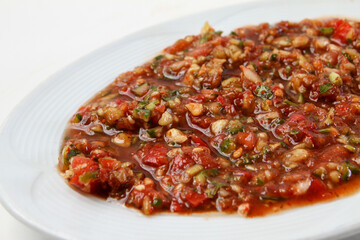 Spicy paste sauce is made with spicy puree, mixed spices and a mixture of pepper, tomato and garlic. Served with kebabs