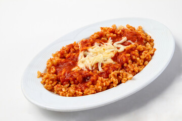 bulgur appetizer with cheese and tomato sauce
