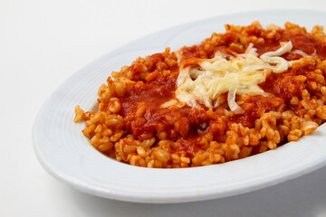 bulgur appetizer with cheese and tomato sauce
