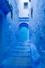 Selbstklebende Fototapeten Blue colored houses and streets in Chefchaouen, Morocco.  Chefchaouen is a small city in the Rif Mountains and is often referred to as the “blue city” or the “blue pearl of Morroco”.   © JHVEPhoto