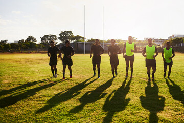 Sports, team and men with warm up for rugby, competition game and practice with training for tournament. Stadium, people and players with running for fitness, endurance and group for match in France