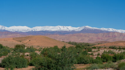 Snow capped Atlas Mountains seen from Rose Valley in 2024 Autumn, Morocco. 