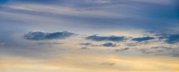 dark blue clouds in the evening sky after sunset