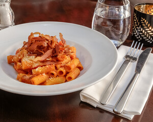 Classic Amatriciana Traditional Italian Pasta with Guanciale and Tomato Sauce