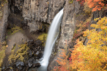 Hundafoss waterfall in autumn