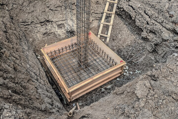 Formwork with reinforcement bar for pad footing. Construction of pad footing foundation where the...
