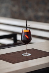A glass of fresh delicious sangria on the table in the restaurant