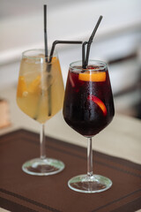 A glass of fresh delicious sangria on the table in the restaurant
