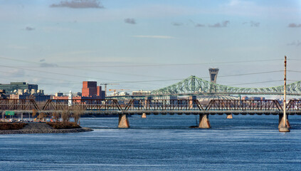 Naklejka premium Montreal Cityscape with Bridges and Olympic Stadium