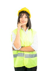 Portrait of an engineer smiling and wearing yellow vest and helmet, isolated on white background