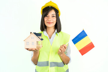 Home inspector woman or engineer holding romania flag and detached house model