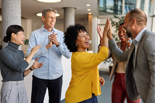 business meeting businesswoman woman office entrepreneur presentation success applause applauding audience achievement career job congratulation teamwork