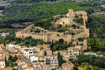 Fototapeta premium The Castle of Capdepra on the hill above the small town of Capdepera, Mallorca, Majorca, Balearic Islands, Spain, Europe