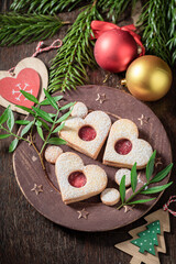 Stained glass cookies as snack Christmas on brown plate