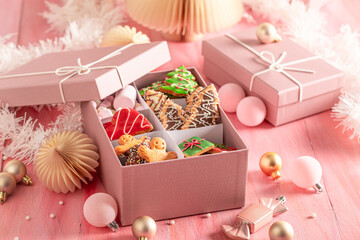 Christmas gingerbread cookies with Christmas decorations and baubles..