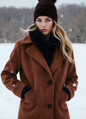 Beautiful glamour model in cozy winter coat made of thick wool v6
