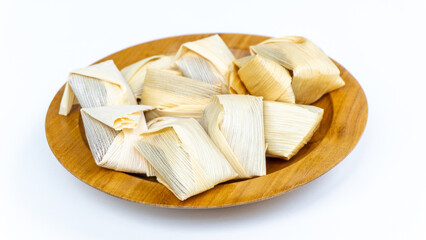 Wajik kletik is a cake originating from Blitar. Wajik kletik is made from sticky rice, coconut milk, and brown sugar. This food is wrapped using corn husks or klobot.