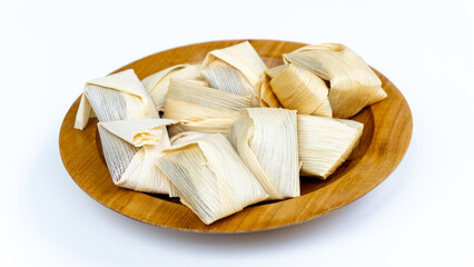 Wajik kletik is a cake originating from Blitar. Wajik kletik is made from sticky rice, coconut milk, and brown sugar. This food is wrapped using corn husks or klobot.