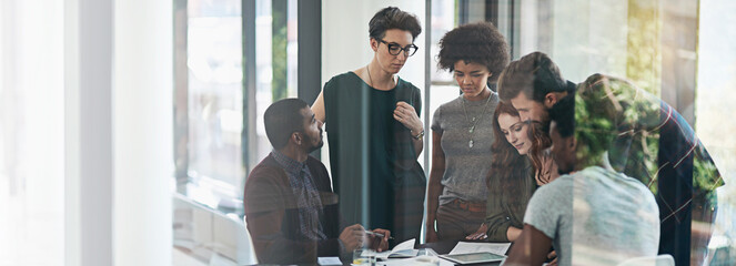 Designers, tablet and talk in office for meeting, project feedback or teamwork. Creative people,...