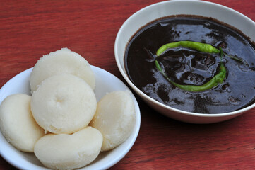 Puto at Dinuguan
( Pork blood stew and steamed rice cake)