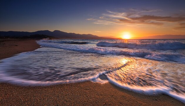 late sunset over wavy sea on acharavi beach corfu
