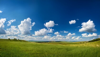 Obraz premium a clear blue sky with fluffy white clouds creating a picturesque landscape